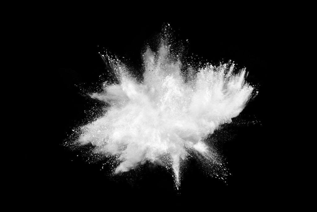 White powder on black background